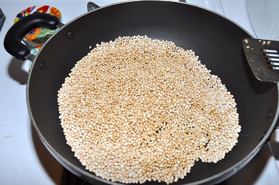 Uncooked Moghrabieh in a wok.