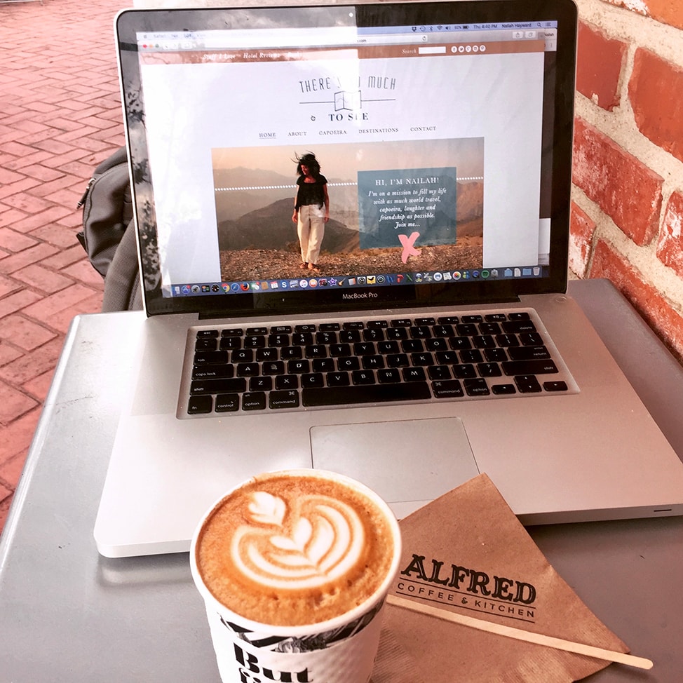 My laptop and a cappuccino at a cafe in Los Angeles