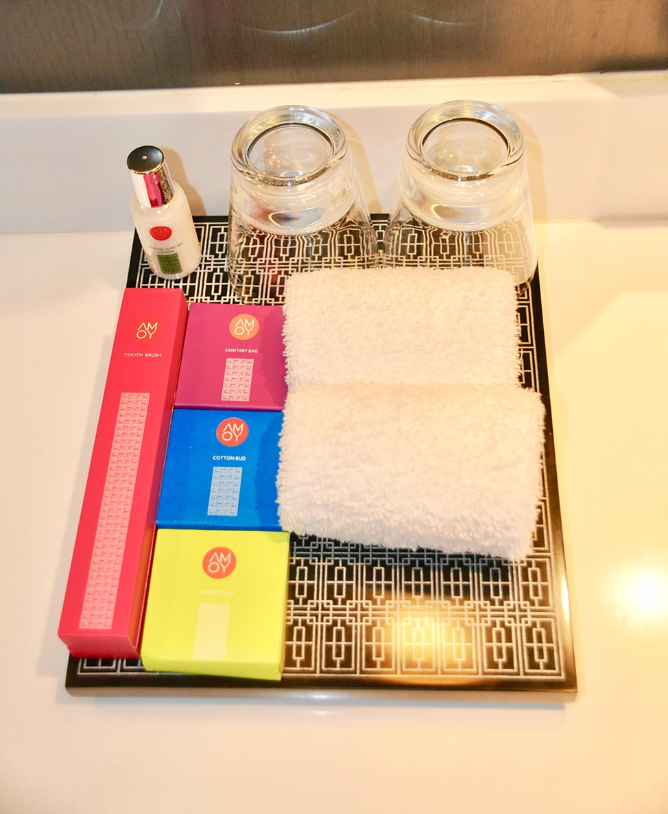 Colorful boxes of amenities at the Amoy Hotel