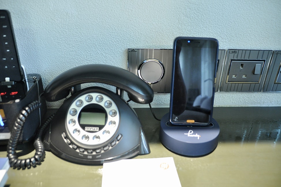 Free Mobile phone available in each room at the Amoy Hotel