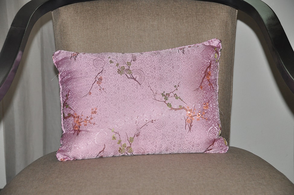 Embroidered Pink Pillow at the Amoy Hotel