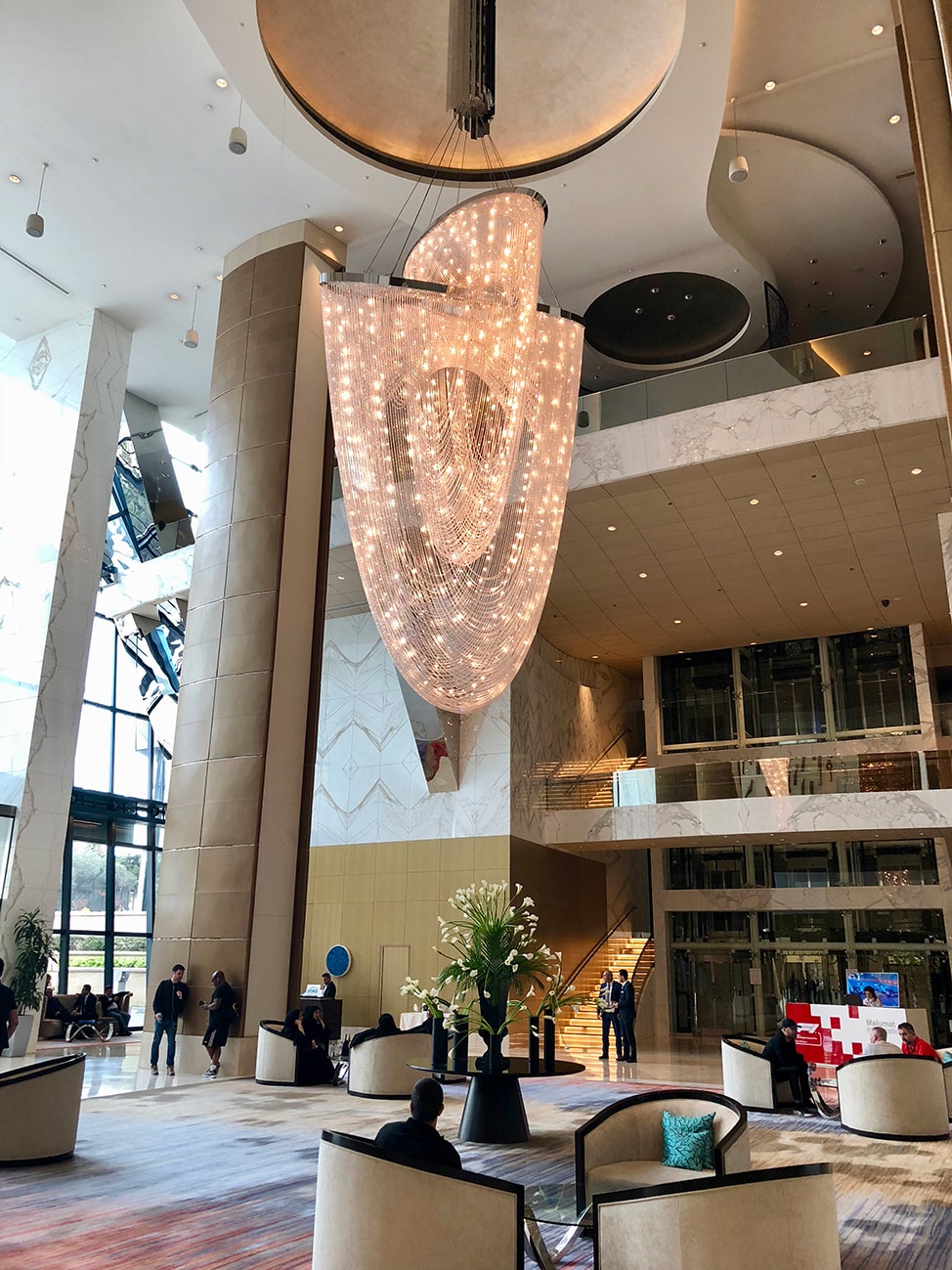 The dramatic chandelier in the lobby of the Fairmont Baku Flame Towers hotel.