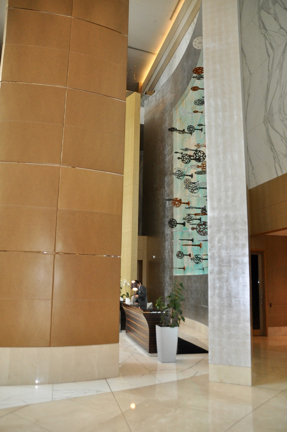 High ceilings in the Fairmont Baku lobby soar about the check in desk.