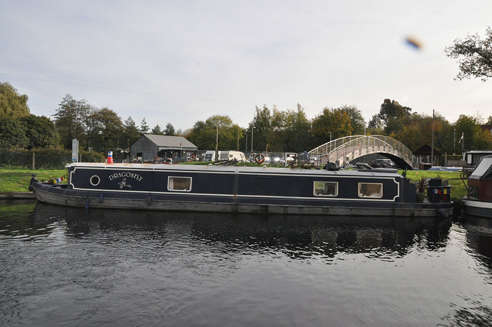 The Dragonfly houseboat moored on the Grand Union Canal in Uxbridge UK