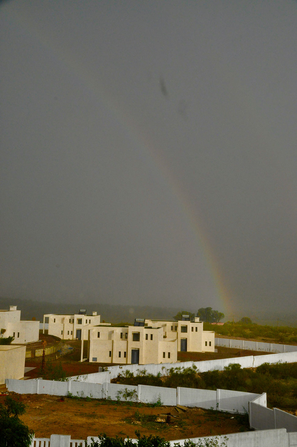 Rainbow against a dark sky in Essaouira