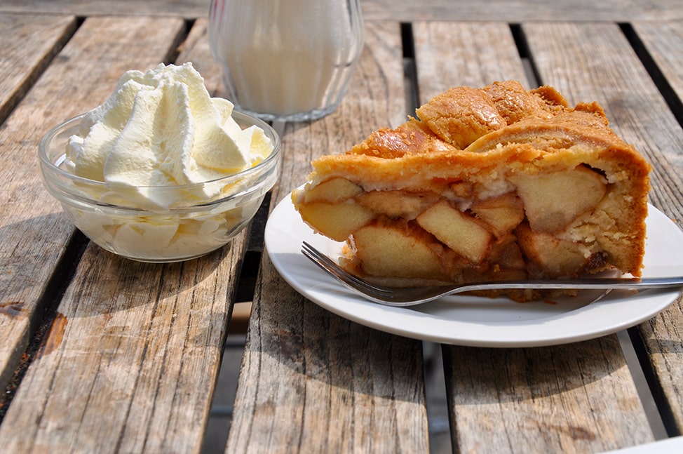A solo travel splurge may be as simple as a decadent dessert like this apple pie found in Amsterdam. 